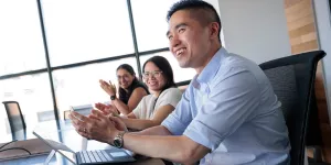 Healthcare practitioners sitting at a table.
