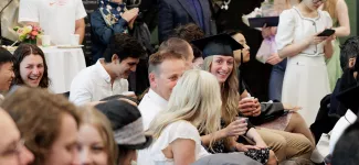 Smiling students attending the Pharm Sci Dean's Reception.