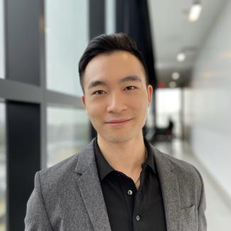 Headshot of Alex Tang.